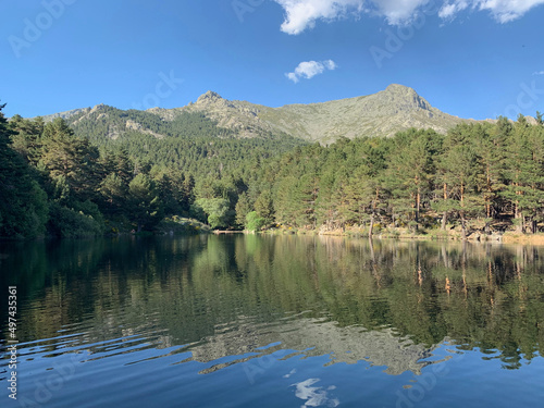 Fototapeta Naklejka Na Ścianę i Meble -  landscape with lake, sky and clouds in the mountains of Madrid