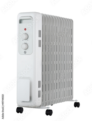 Oil-filled electrical mobile radiator heater for home heating and comfort control in the room in a wooden country house.