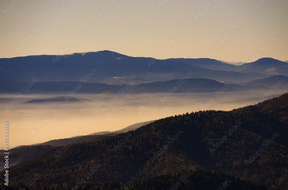 Scenic landscape with mountains covered in fog. Yedigoller National Park, Bolu, Turkey.
