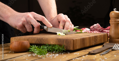 vegetables and knifes on a chopping board