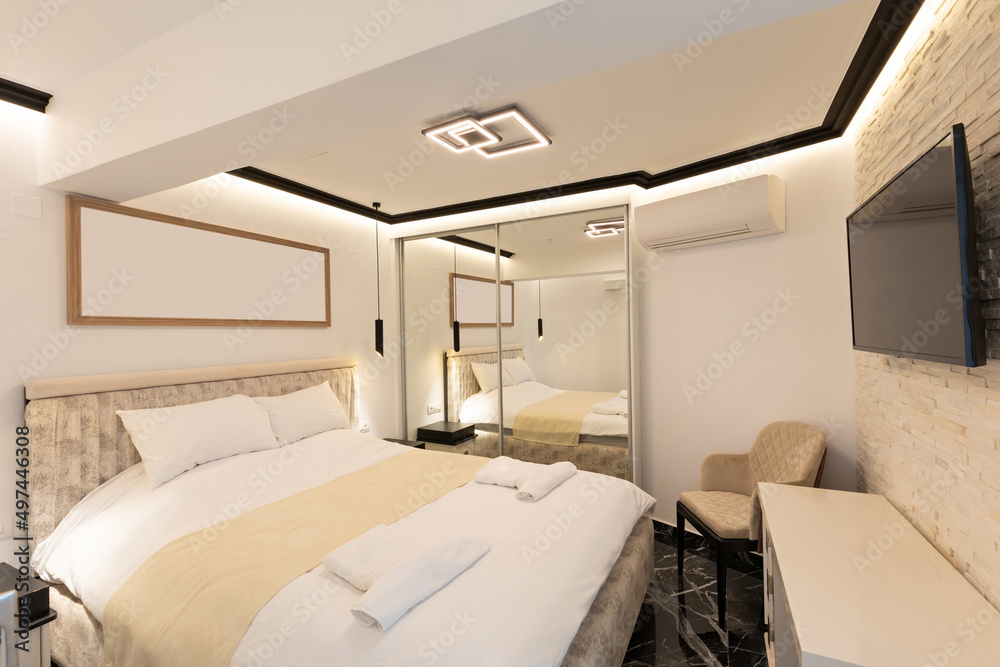 Interior of a luxury double bed hotel bedroom Interior of a luxury double bed hotel bedroom