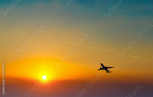 Passenger plane in the blue sky - Air travel