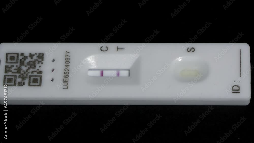 Coronavirus (COVID-19) rapid lateral flow test shows up a positive result. Coronavirus (COVID-19) rapid lateral flow test shows up a positive result.