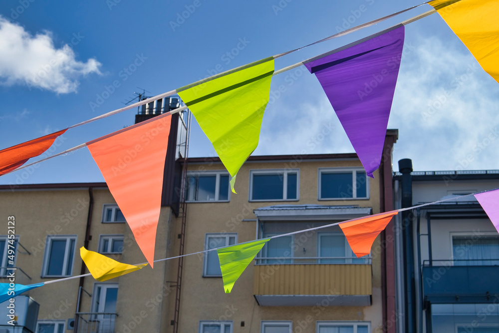 Colorful bunting flags chains outdoors Stock Photo | Adobe Stock