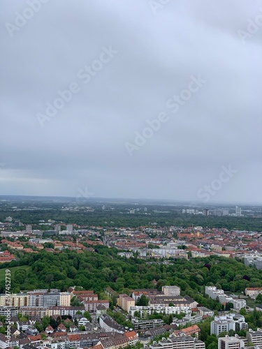 Aerial view looking over Munich Germany with buildings and landmarks. 