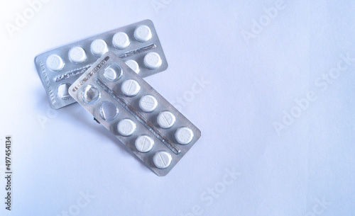 White tablets packed in silver blister. indoors.