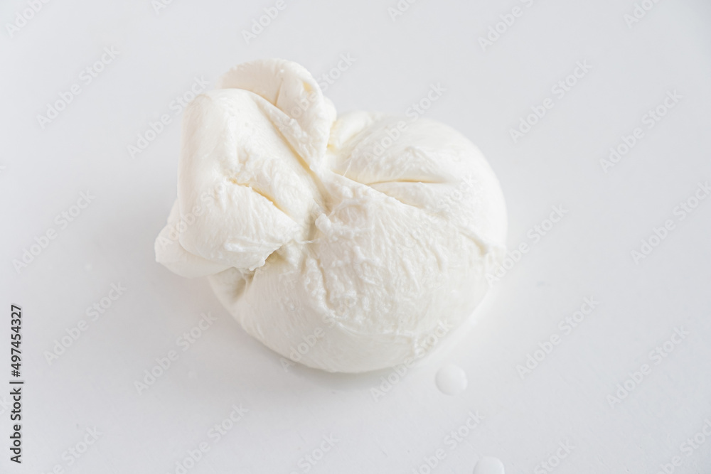 burrata is a fresh italian cheese made from mozzarella and cream