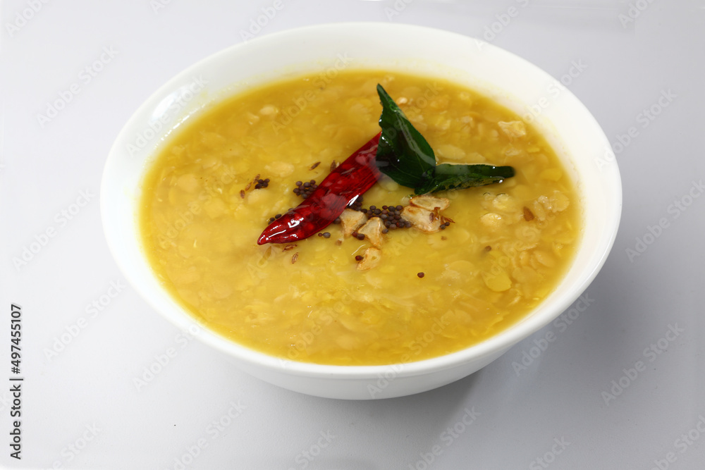 Indian food tuvar Daal or yellow lentil soup or curry in ceramic bowl Indian food tuvar Daal or yellow lentil soup or curry in ceramic bowl