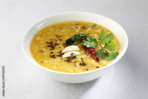 Indian food tuvar Daal or yellow lentil soup or curry in ceramic bowl 