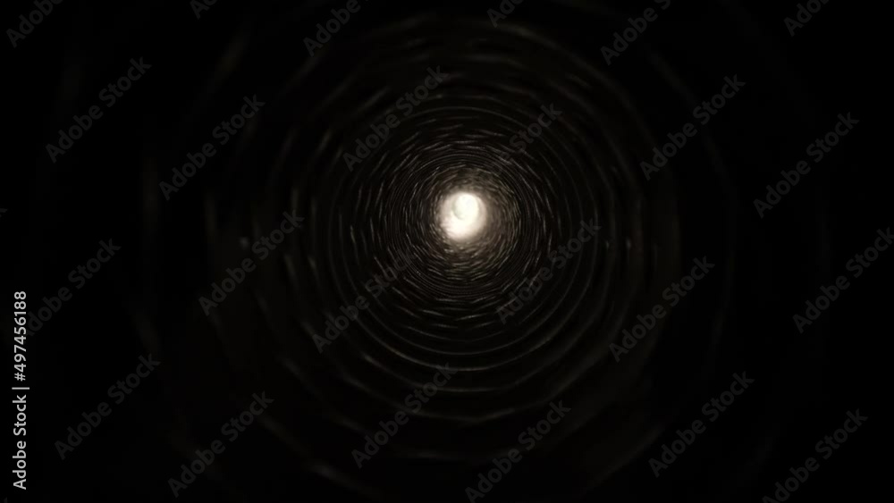 4K: Light at the end of the tunnel. Travelling through a passage or tube to brightness. Tracking motion with probe lens. Stock video clip footage