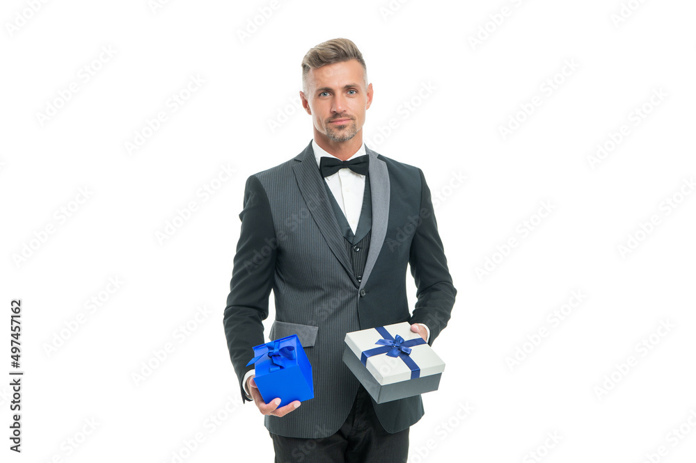grizzled man in tuxedo and bow tie hold present box isolated on white background grizzled man in tuxedo and bow tie hold present box isolated on white background