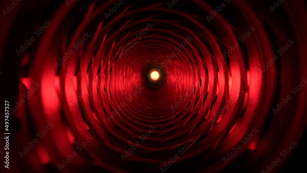 4K: Travelling through a tunnel, passage or tube with red lights. Hell. Tracking motion with probe lens. Stock video clip footage