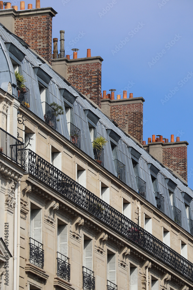 Fototapeta premium Legendary Parisian attics on old 19th century buildings