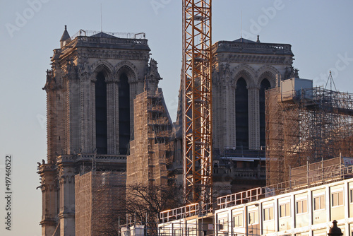 Notre Dame Cathedral in scaffolding under reconstruction at sunset