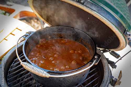 ready to eat - goulash from venison meat - cooked on a charcoal grill at outdoor