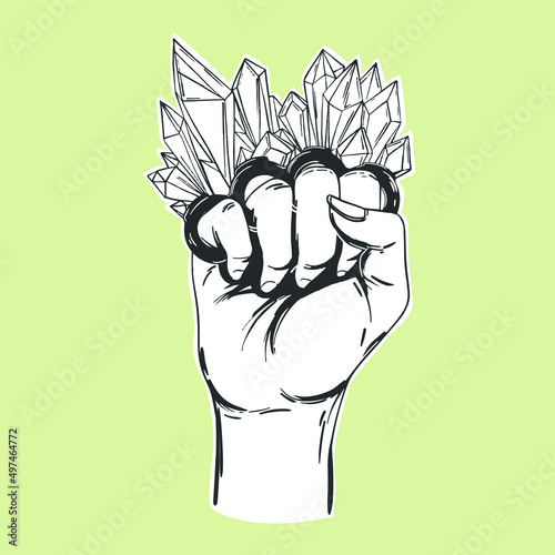 Hand-drawn human hand wearing knuckle ring with crystal black and white vector illustration