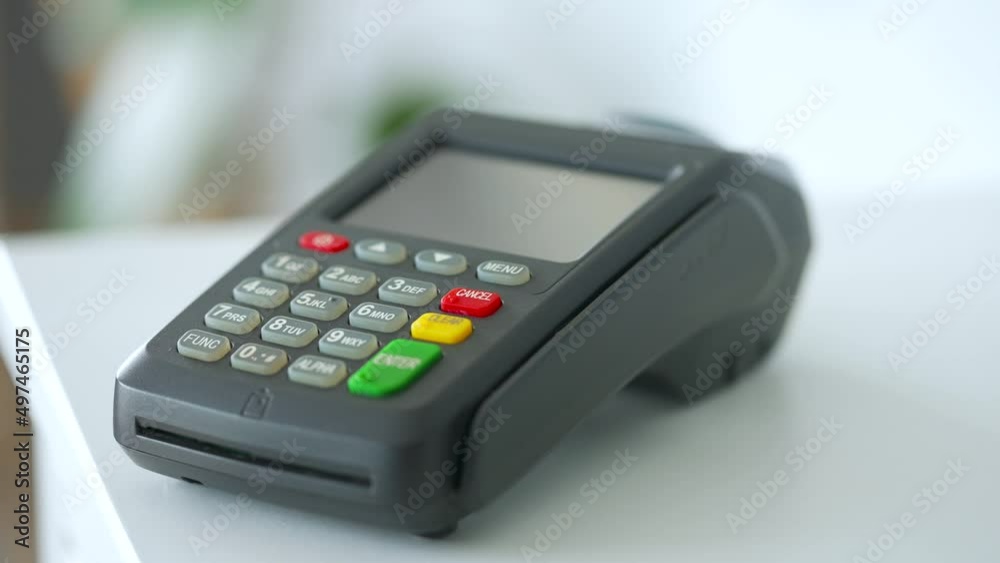 Woman paying with contactless credit card. Wireless money transaction. Wireless payment. Slow motion Woman paying with contactless credit card. Wireless money transaction. Wireless payment. Slow motion