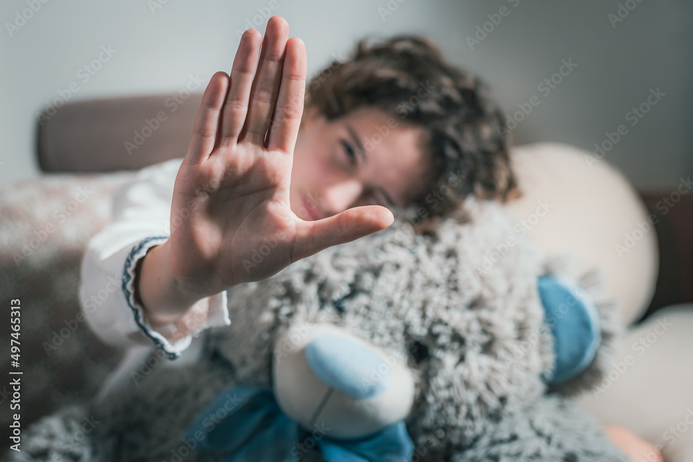 Hand gesture no to domestic violence on blurred background of young girl Hand gesture no to domestic violence on blurred background of young girl