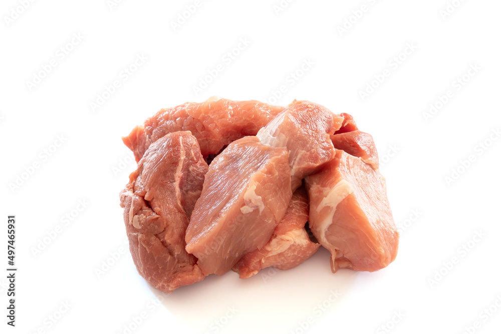 pieces of raw pork meat isolated on a white background