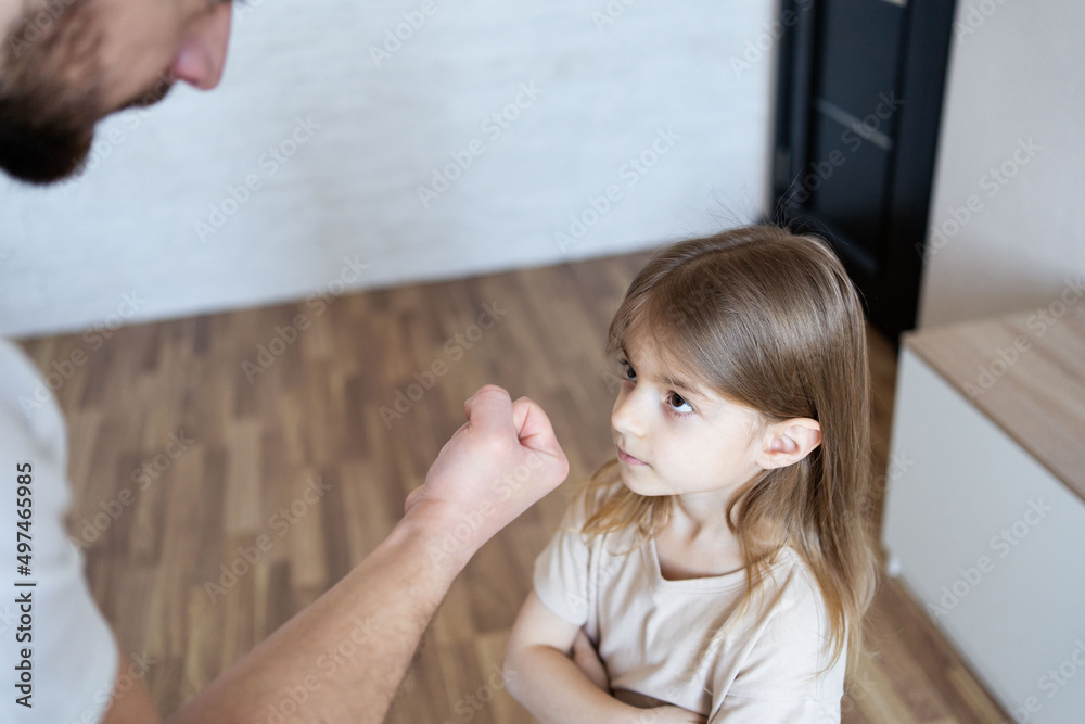 Domestic violence. Strict father.Man scolds a child.Sad crying child. Family violence. Domestic violence. Strict father.Man scolds a child.Sad crying child. Family violence.