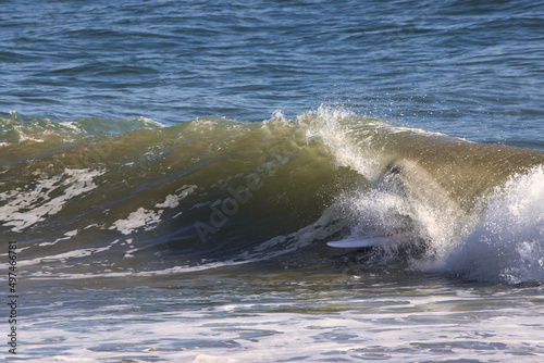 Surfing Rincon cove in California