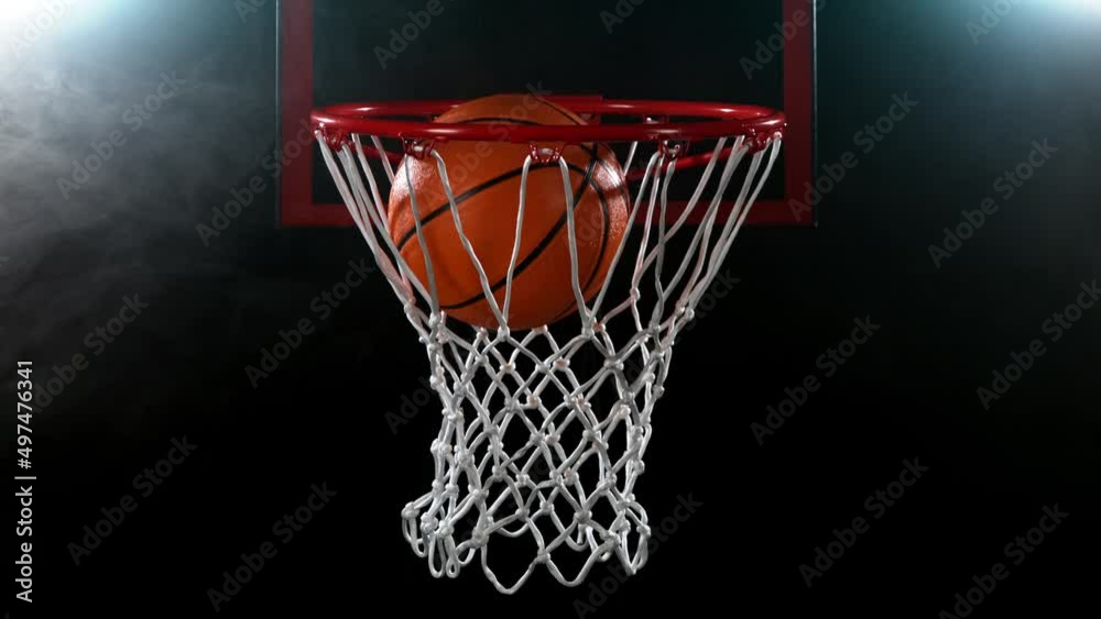 Super slow motion of basketball ball hitting the basket. Filmed on high speed cinema camera, 1000fps. Super slow motion of basketball ball hitting the basket. Filmed on high speed cinema camera, 1000fps.