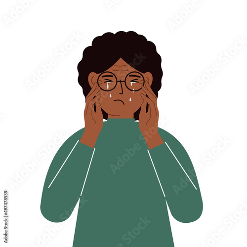 Upset woman cries and holds his head with his hands. The concept of resentment, pain and depression.
