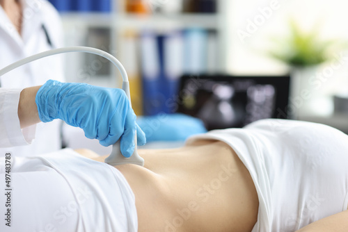 Ultrasound of woman in early pregnancy in clinic