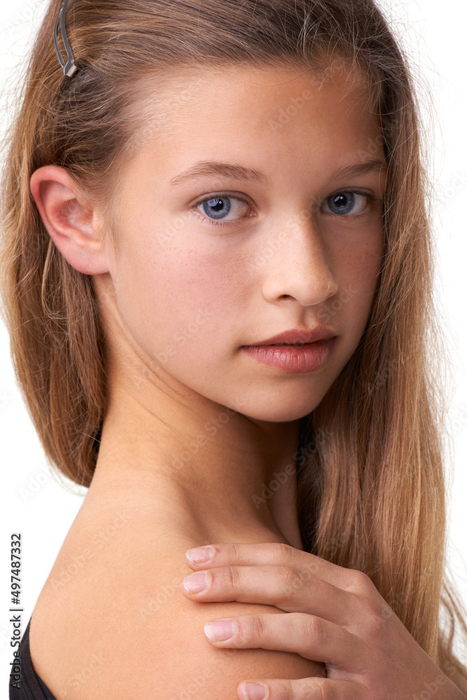 Feeling demure. Cropped view of a cute young teen girl. Feeling demure. Cropped view of a cute young teen girl.