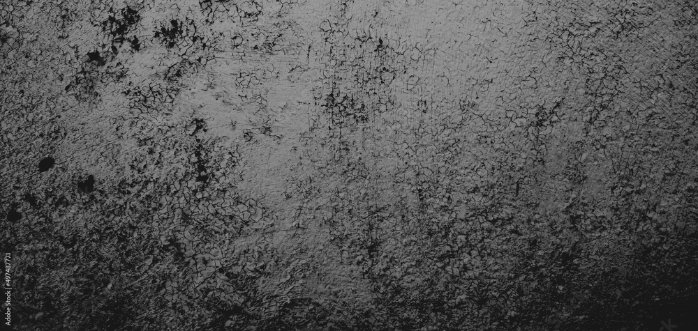 Wall full of scratches. Grungy cement texture for background, Scary dark wall.Black wall
