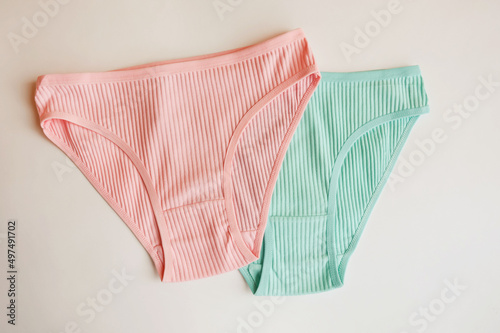 women's underwear. multicolored underpants on a light background. a piece of clothing for a person.