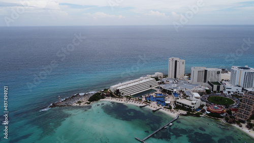 High angle shot of the Tulum Beach in Mexico and the beautiful turquoise waters of the ocean photo