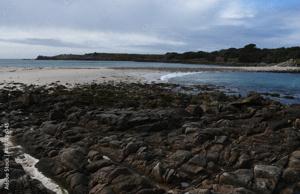 The sand bar that joins The Isle of Gugh to the Island of St Agnes in the Scilly Islands Cornwall