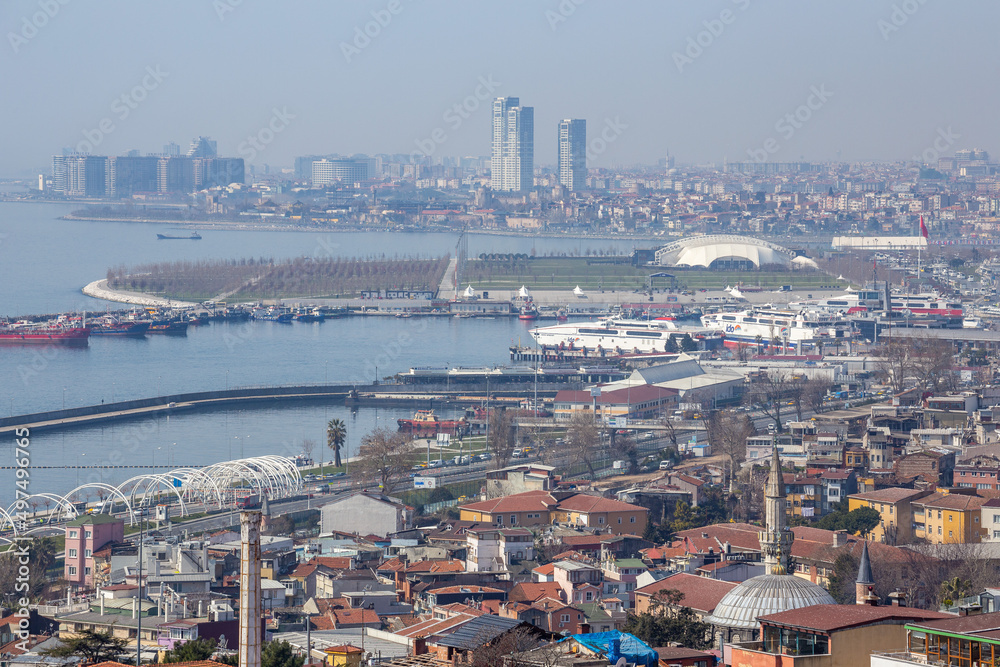 High angle aerial zoomed view of Yenikapi Square and Zeytinburnu district in its background in Fatih, Istanbul, Turkey on March 28, 2022.