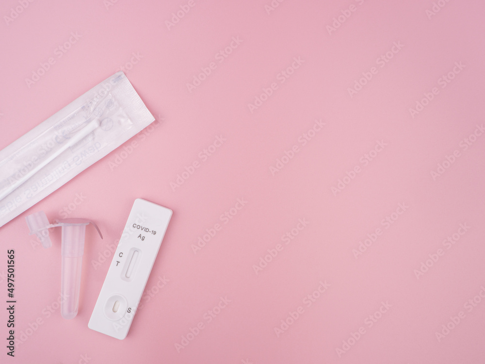 antigen test kit (ATK) for self-testing on isolated pink background. Covid-19 antigen test kit. Copy space blank area for text. antigen test kit (ATK) for self-testing on isolated pink background. Covid-19 antigen test kit. Copy space blank area for text.