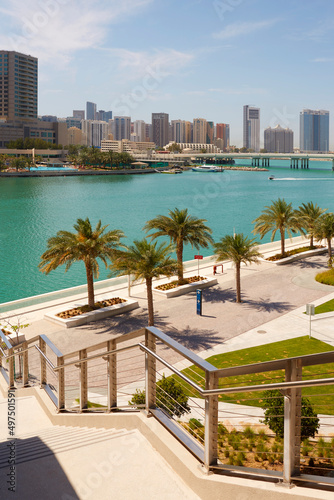 Adu Dhabi park, water high-rise buildings in the background