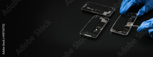 Canvas Print Technician repairing the Cell phone parts and tools for recovery repair phone smartphone and upgrade mobile technology, the concept of computer hardware inside