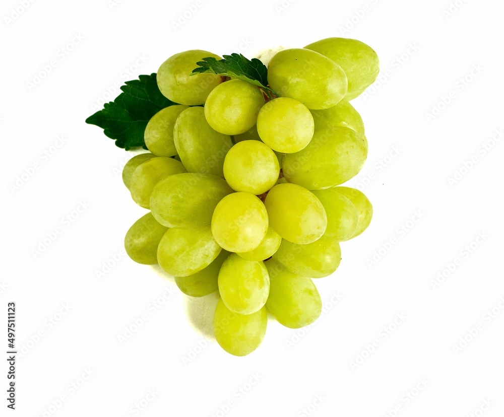Green grapes with fruit leaves isolated on white background. Green grapes with fruit leaves isolated on white background.