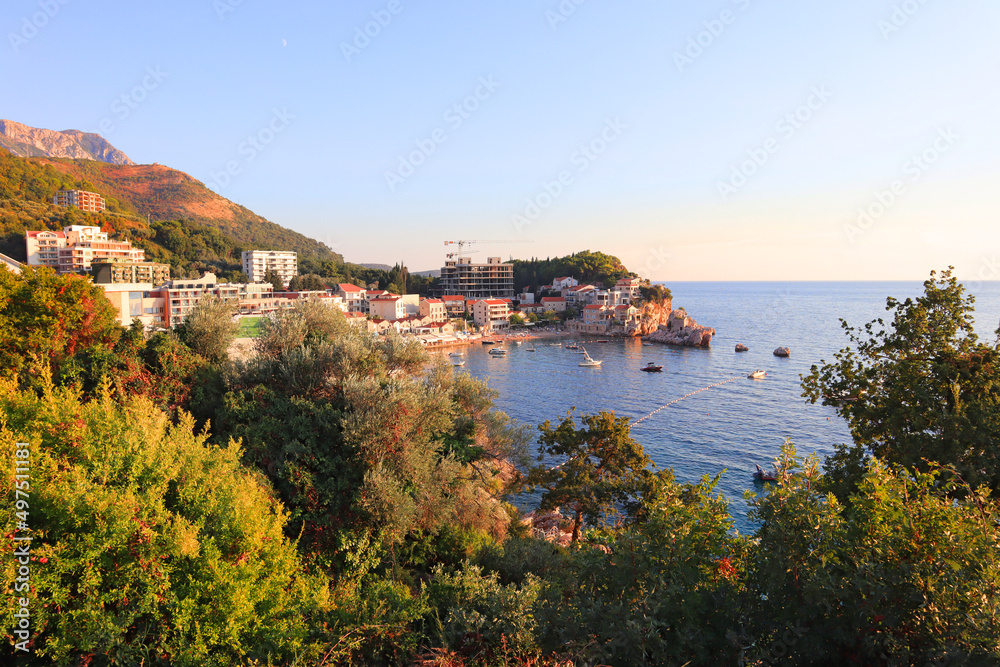 Picturesque coast in the area between Budva and Sveti Stefan at  sunset in Montenegro