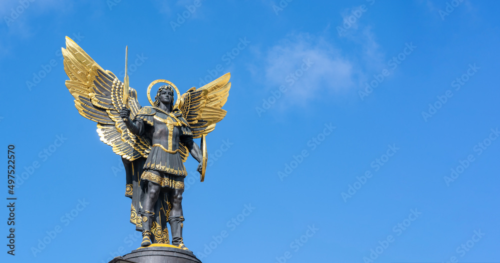 Statue of an angel on Independence Square in Kyiv. Archangel Michael is
