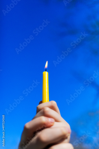 hand with candle