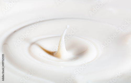 Drop of milk,Milk or droplets of white liquid create ripples,Drop created splash with circle ripple