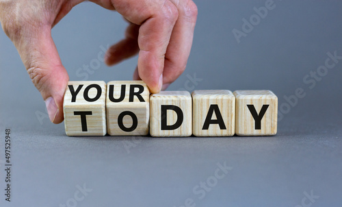 Today is your day symbol. Businessman turns wooden cubes and changes concept words Today to your day. Beautiful grey background, copy space. Business, motivation today is your day concept.