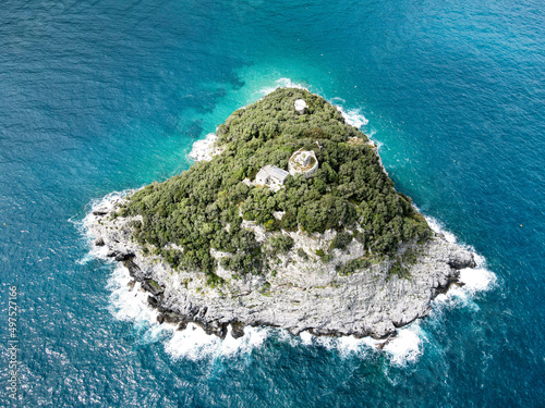 Aerial view of Bergeggi island, heart island from above, in Liguria, north Italy. Drone photography of the Ligurian coast, province of Savona with Spotorno and the island of Bergeggi. © AerialDronePics