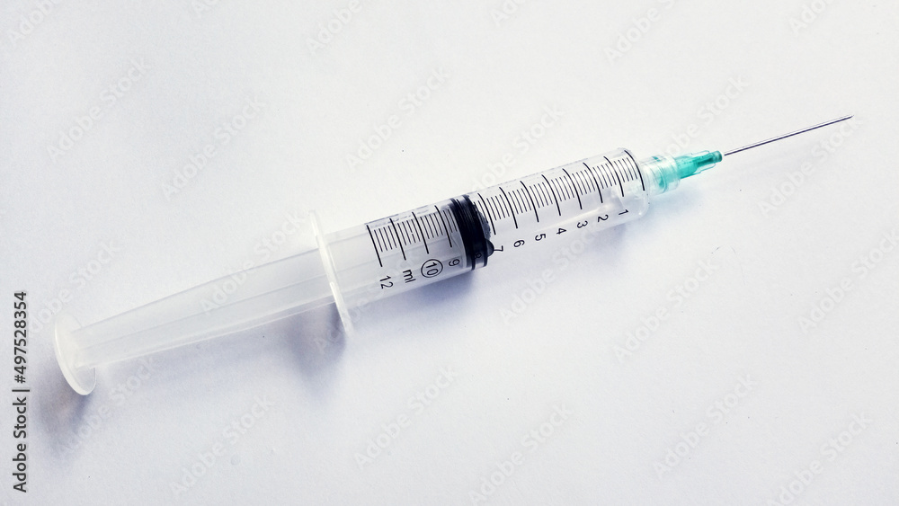 An empty syringe isolated on white background An empty syringe isolated on white background