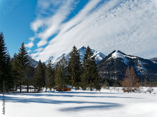 Österreichische Berglandschaft. Winterzauber und Langlaufen am Pertisau am Achensee in Tirol zwischen Tristenautal, Falzthurntal, den majestätischen Gebirgszügen von Dristenkopf, Rofan und Karwendel photo