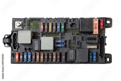 Automotive fuses on a black panel with holders and multi-colored markings - a protective device that opens the electrical circuit when the rated current in the circuit is exceeded. Electrical Repair photo