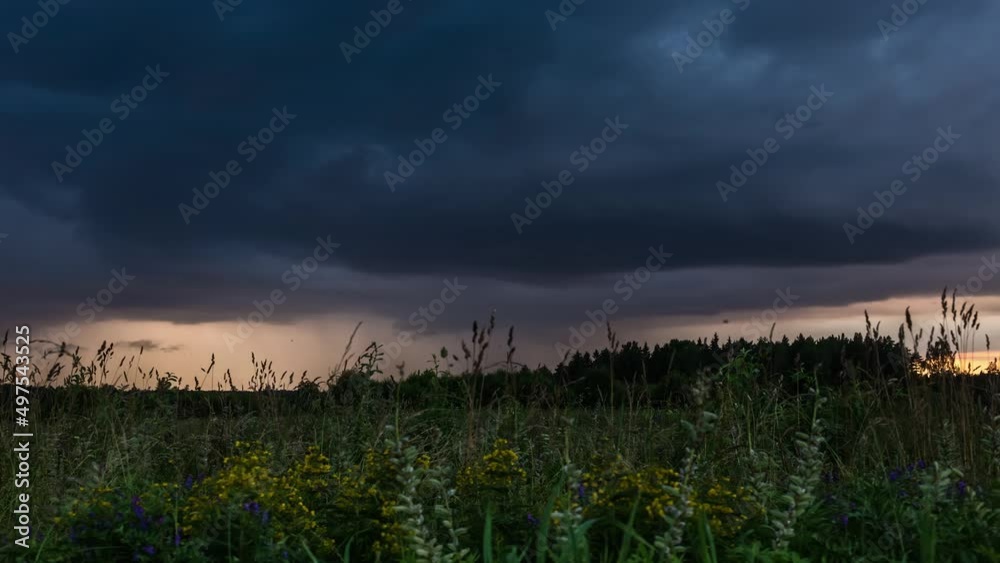 Gray Stormy Clouds Over Spring Flower Fields Near Countryside. Timelapse Gray Stormy Clouds Over Spring Flower Fields Near Countryside. Timelapse