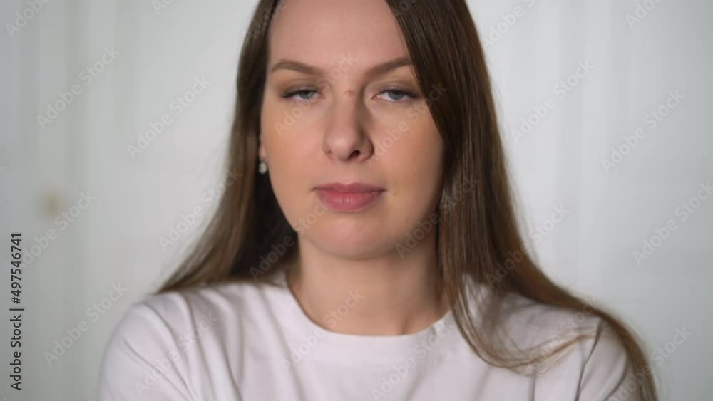 A young woman coughs. Girl sick. Illness, disease. Cold, infection or virus. Female at home. Influenza symptom. A young woman coughs. Girl sick. Illness, disease. Cold, infection or virus. Female at home. Influenza symptom.