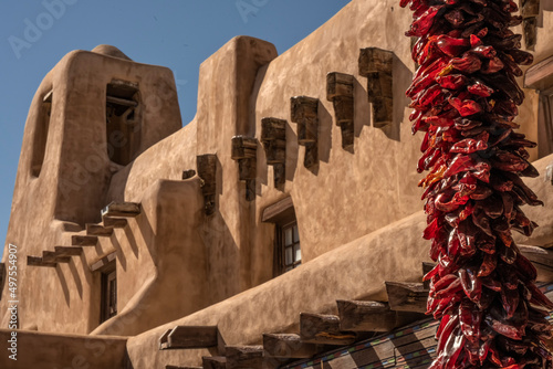 Adobe & red chili peppers;  Santa Fe;  New Mexico
 photo